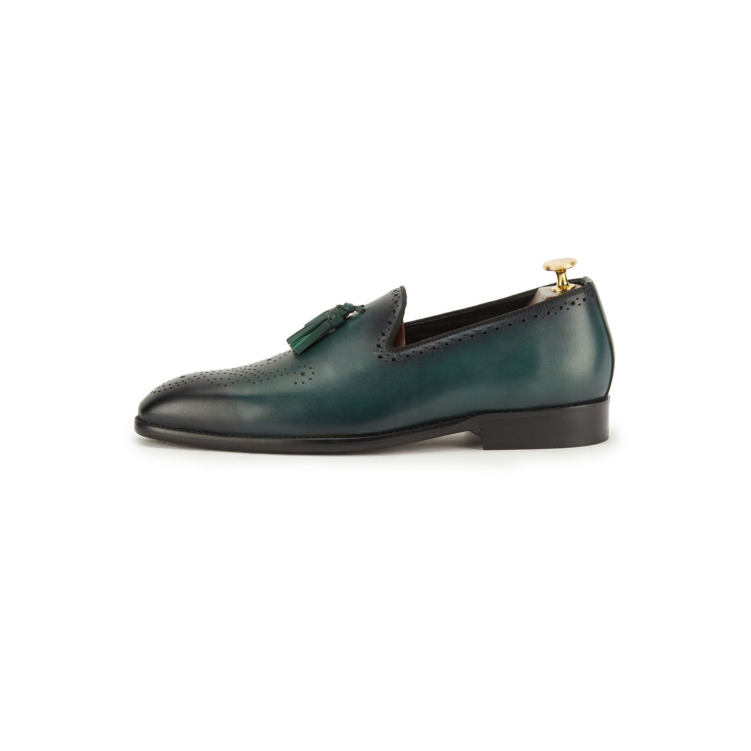 Best mens shoes online india. Dark Green pure leather men's shoe for party wear. Green comfortable tassel slip ons, mens luxury shoes that are handcrafted in pure european leather and Italian fits available at Vantier shooes online shop. 