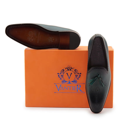 Best mens shoes online india. Dark Green pure leather men's shoe for party wear. Green comfortable tassel slip ons, mens luxury shoes that are handcrafted in pure european leather and Italian fits available at Vantier shooes online shop. 